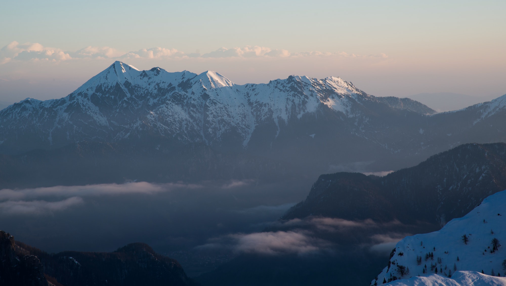 Winter fairy tale at sunset in the mountains